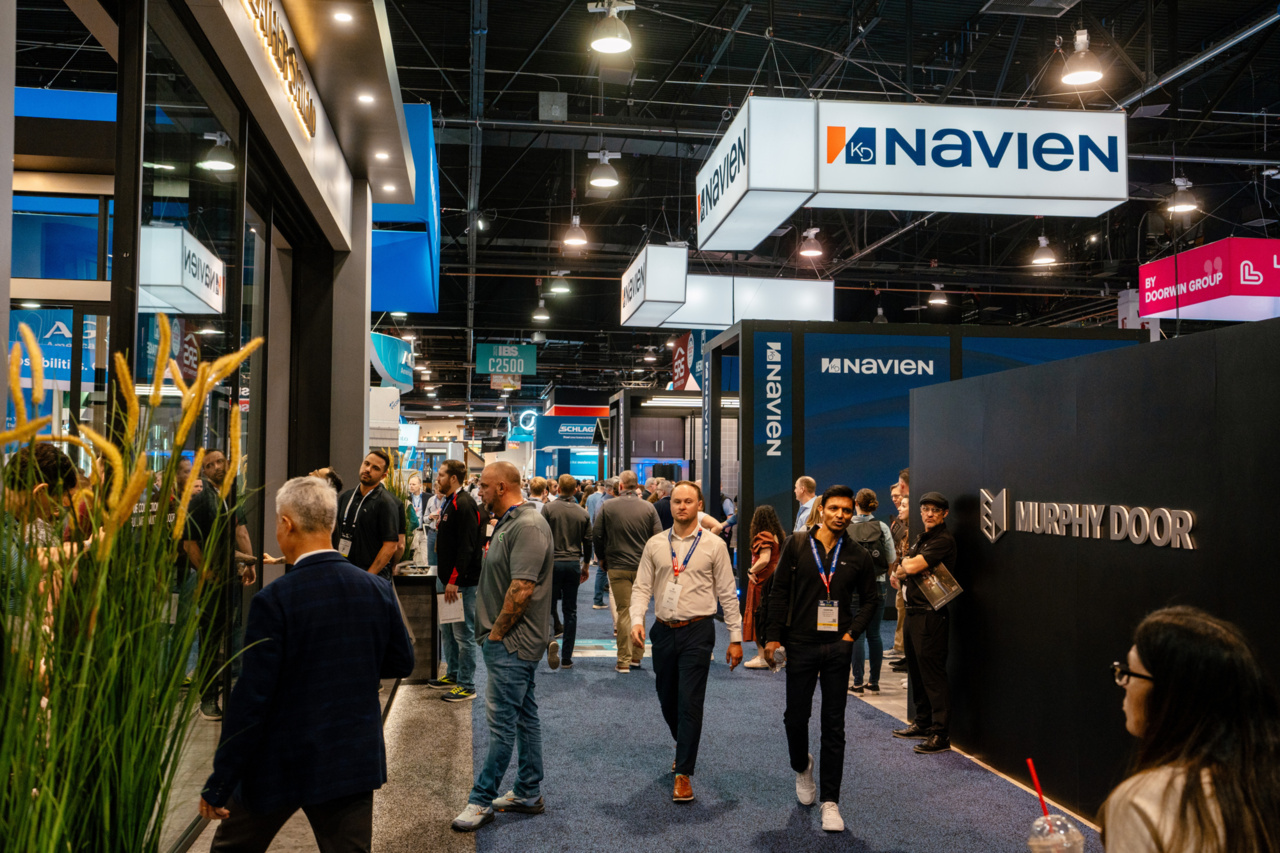 People walking around Builders' Show exhibit floor